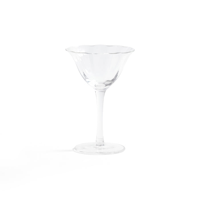Clear martini glass on a white background