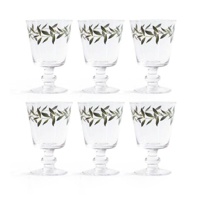 Set of six clear glasses with olive leaf design on a white background