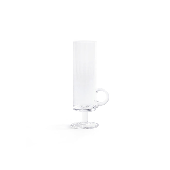 Clear glass mug with heart-shaped handle on a white background