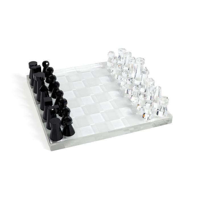 Chessboard with black and clear chess pieces on a white background