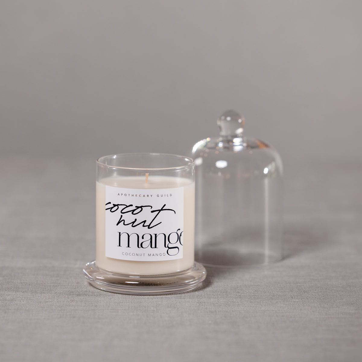 Zodax Coconut Mango Scented Candle Jar with Glass Dome