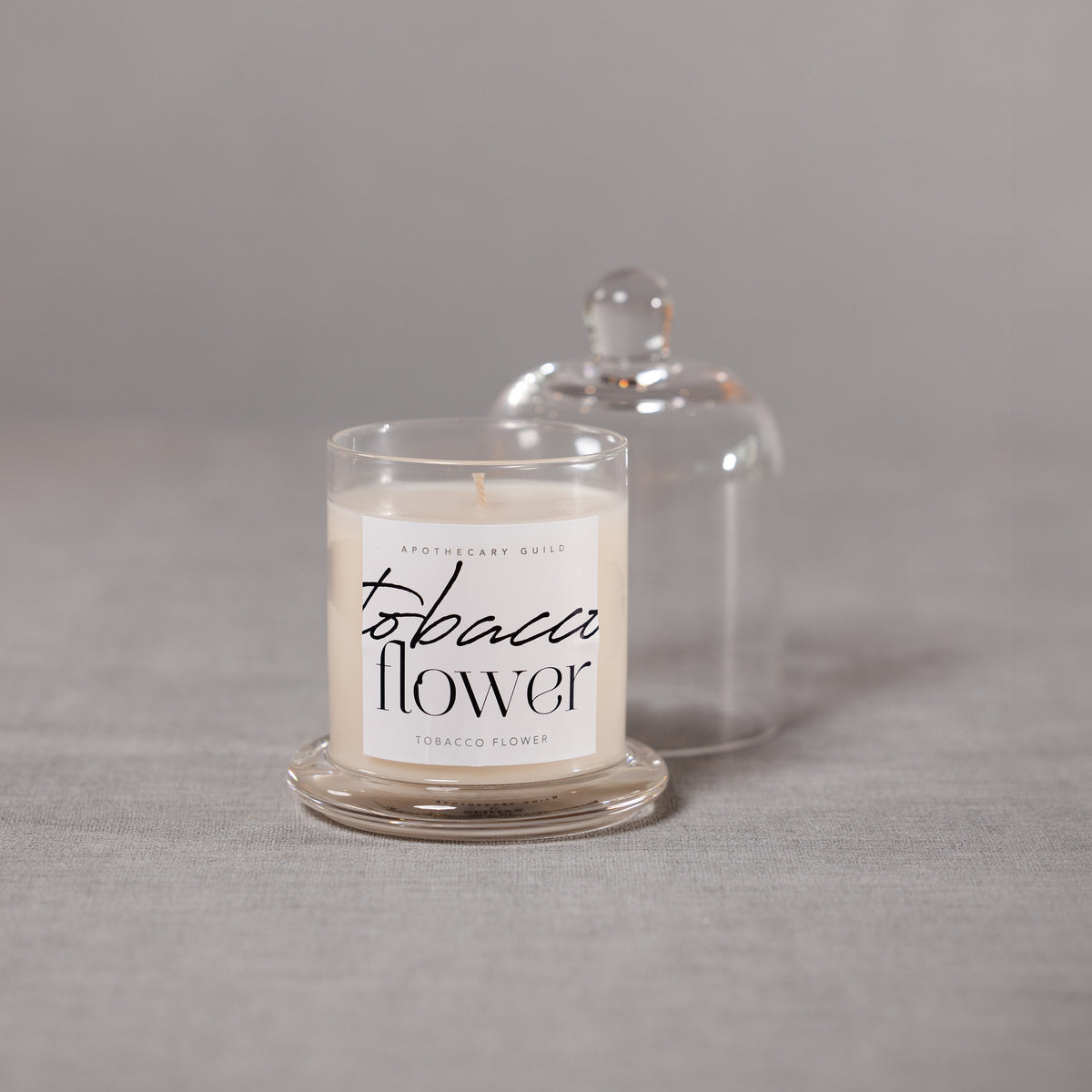 Zodax Tobacco Flower Scented Candle Jar with Glass Dome