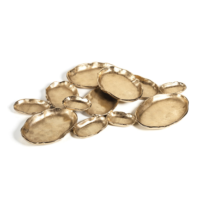 Set of gold decorative plates on a white background