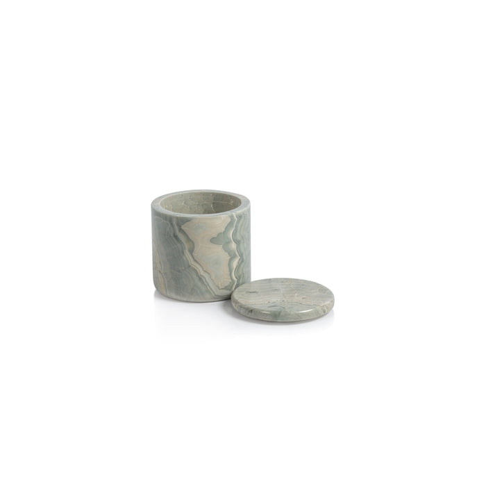 Tasman blue onyx canister jar with lid, cylindrical stone texture, pale blue-gray swirls, hollow interior, on white