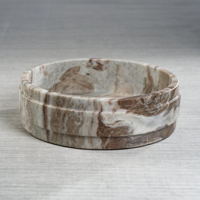 Marble-patterned bowl on a gray background