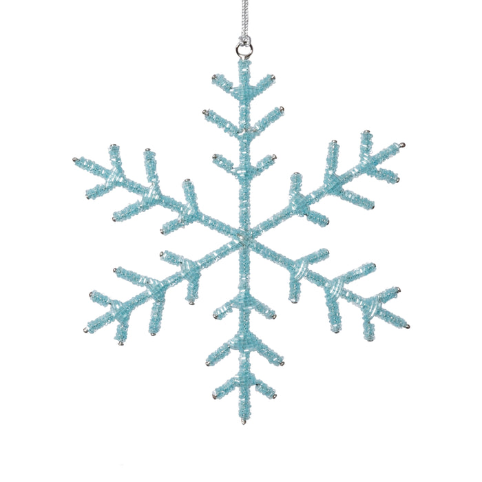 Blue snowflake ornament on a white background