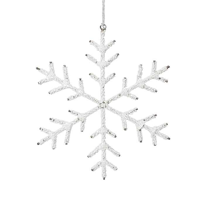 Decorative snowflake ornament with beads on a white background