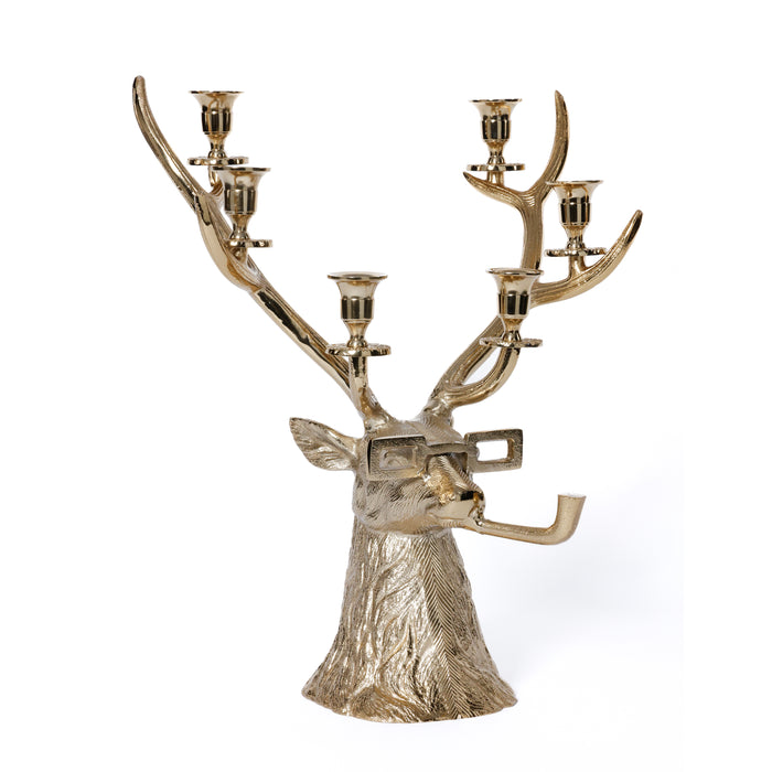 Gold deer head candelabra with antlers on a white background