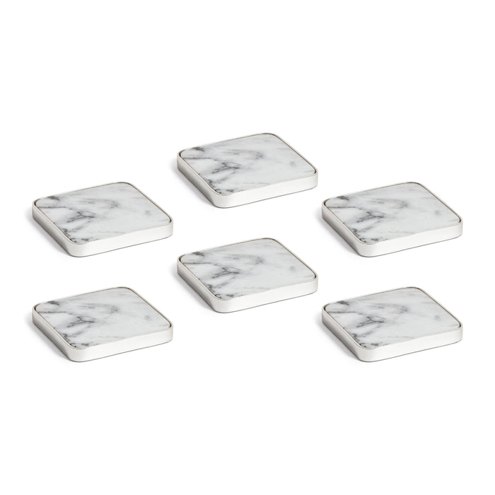 Set of six marble-textured square coasters on a white background