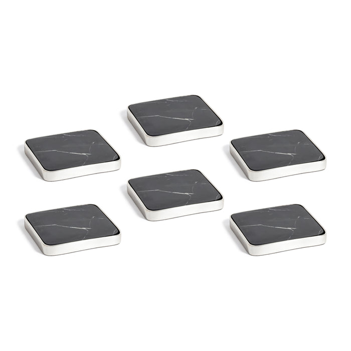 Set of six square marble coasters with black and white marbled pattern on a white background