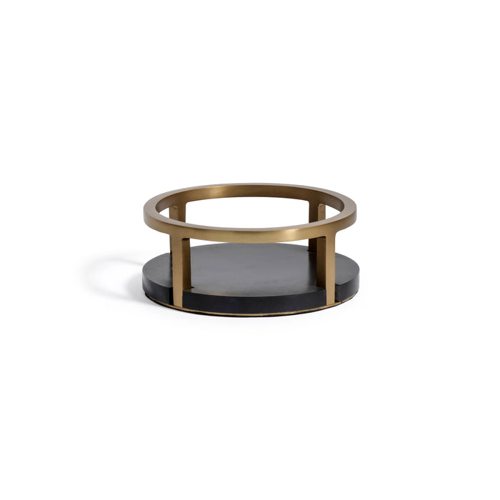 Small round table with gold frame and black base on a white background