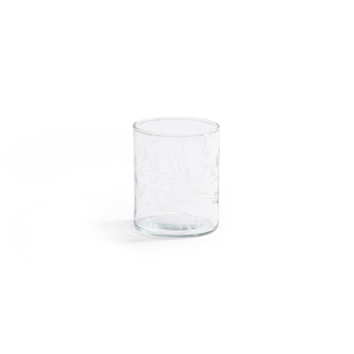 Clear glass tumbler on a white background