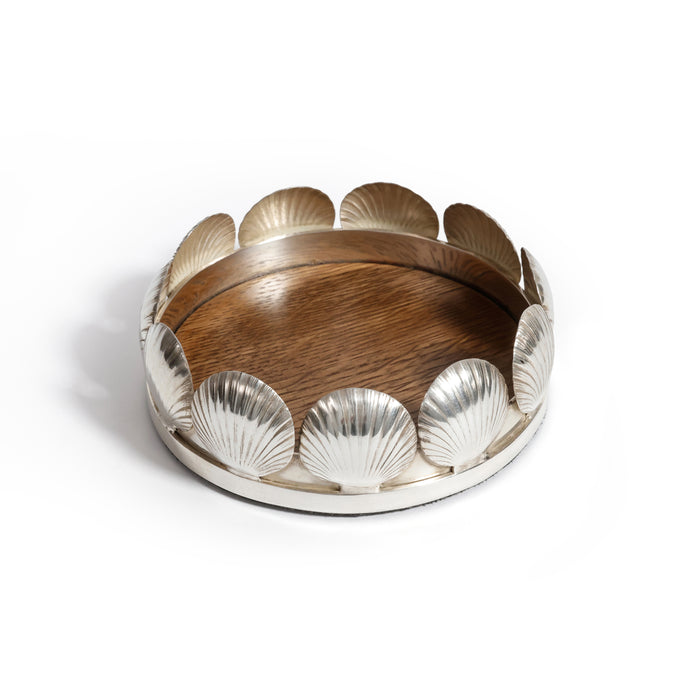 Decorative bowl with wooden center and metallic shell-like edges on a white background
