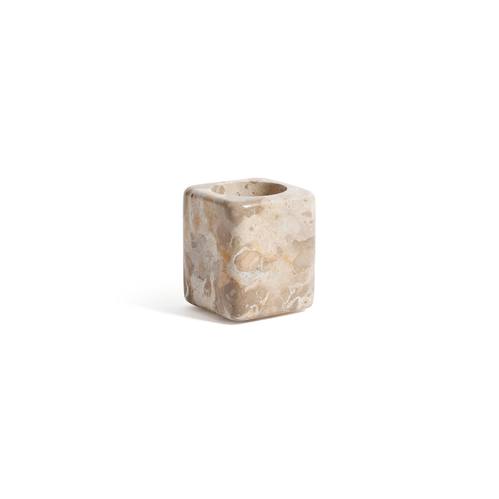 Square stone candle holder on a white background