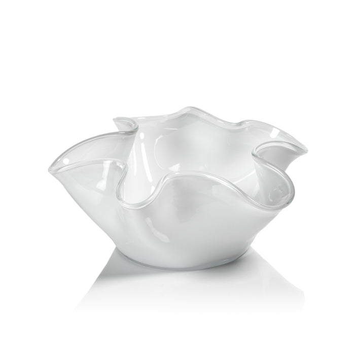 Clear glass wave-edge bowl with white interior, scalloped ruffled rim, concave petals, reflective surface on white