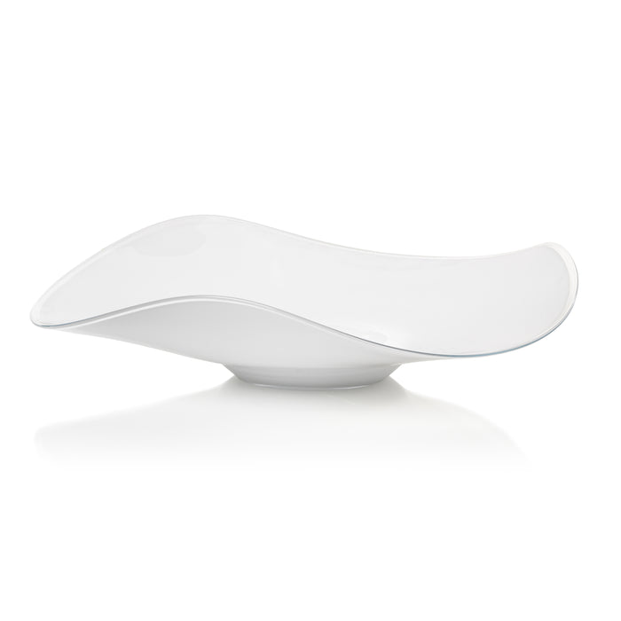 An opal white glass bowl with a unique wave shape design.