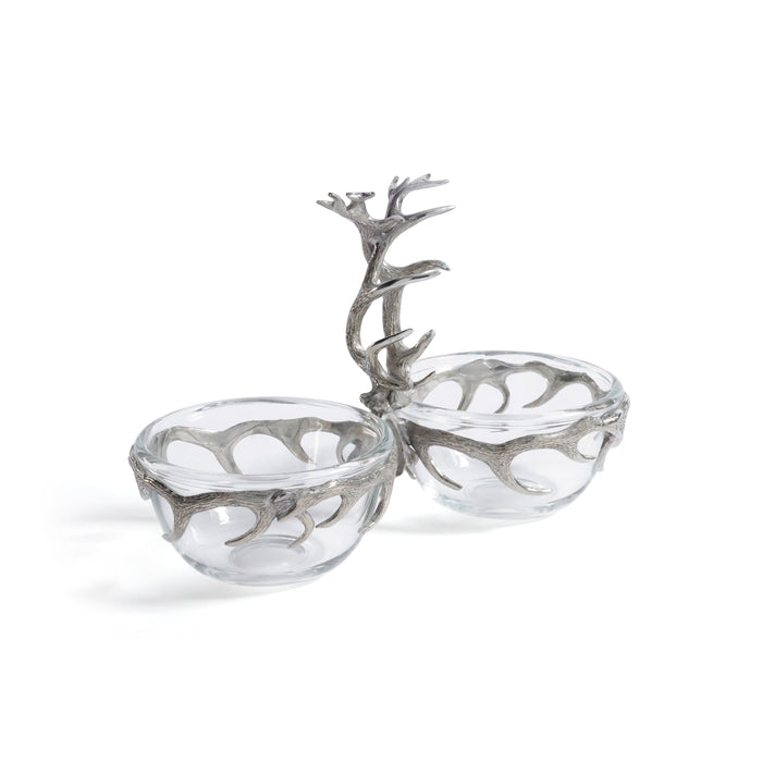 Decorative glass bowls with metal antler-like designs on a white background