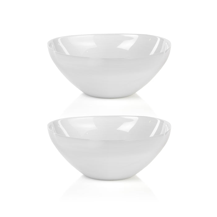 Two white ceramic bowls on a white background
