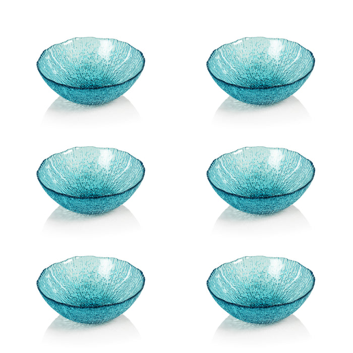 Set of six turquoise glass bowls on a white background