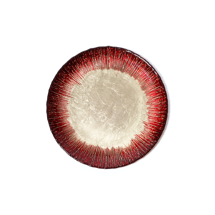Round ceramic plate with red rim on a white background