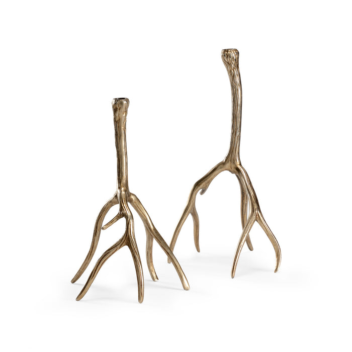 Two decorative antler stands on a white background