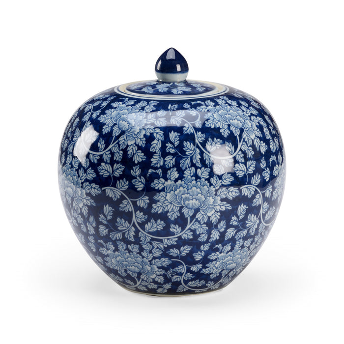Blue and white floral-patterned ceramic jar with lid on a white background