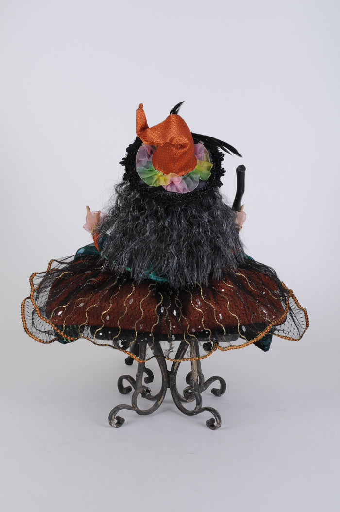 Decorative bird figurine with intricate details on a white background