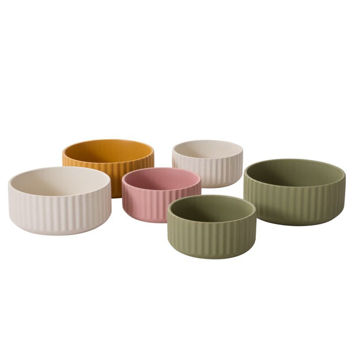Set of six colorful ceramic bowls on a white background