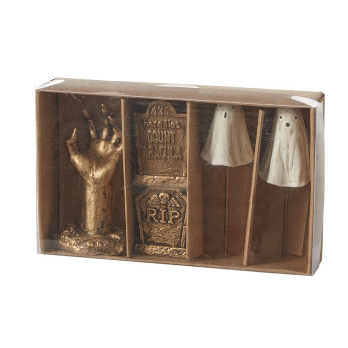 Set of Halloween-themed decorations including a hand, tombstone, and ghosts in a box packaging.