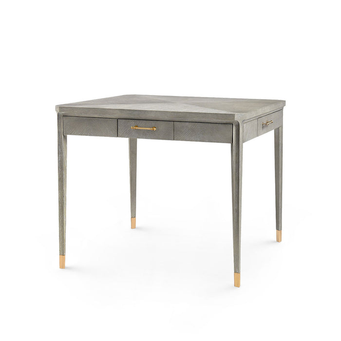 Gray desk with gold accents on a white background