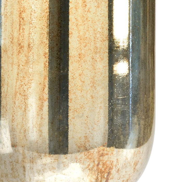 Close-up of a textured ceramic vase with vertical stripes on a white background