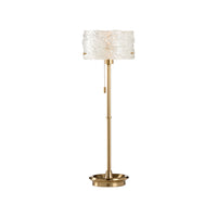 Floor lamp with gold base and textured white shade on a white background