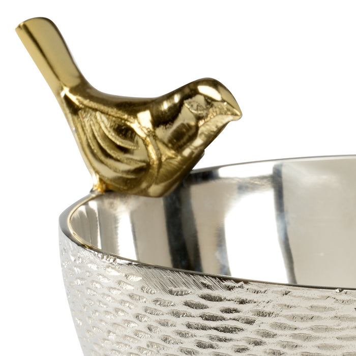 Decorative bowl with a gold bird finial on a white background