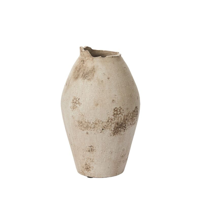 Decorative vase with a textured surface on a plain background
