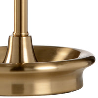 Close-up of a gold pendant light fixture on a white background