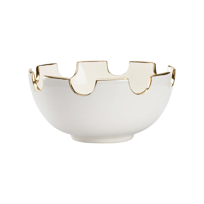 White decorative bowl with gold trim on a white background