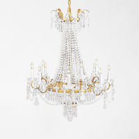 Decorative chandelier with crystal elements on a white background