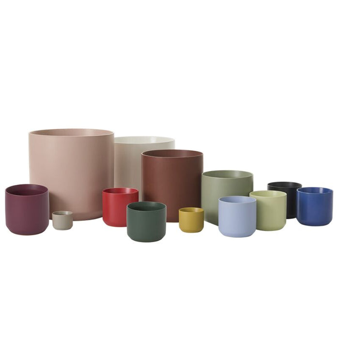 Set of colorful ceramic pots on a white background