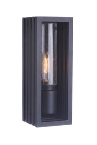 Carmel outdoor wall lantern in textured black with a vertical rectangular frame and an exposed Edison-style bulb inside a