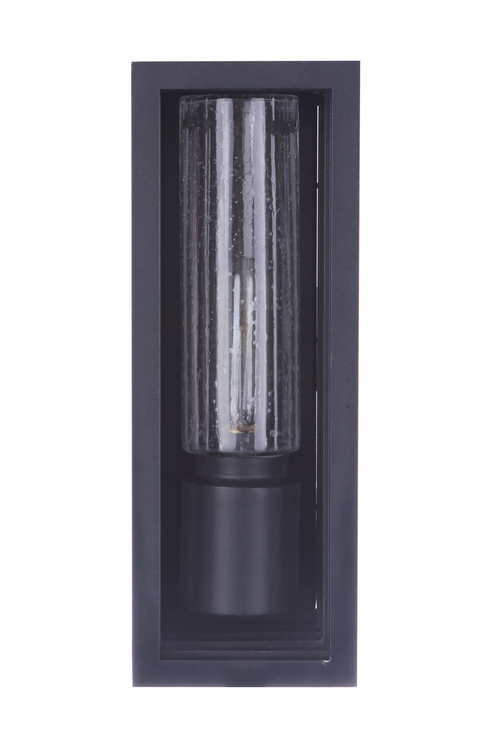 Cylindrical clear glass outdoor wall light with a textured pattern, mounted in a rectangular black frame against a dark