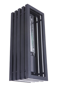 Craftmade Carmel outdoor wall lantern in textured black with a rectangular, slatted metal frame and glass cylinder bulb
