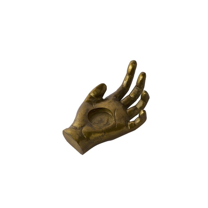 Bronze hand-shaped object on a white background