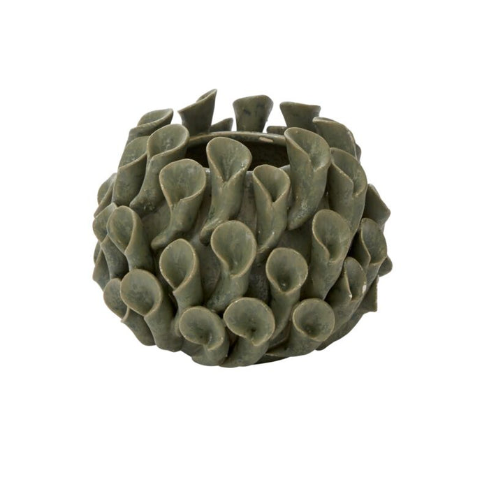 Textured green ceramic vase on a white background