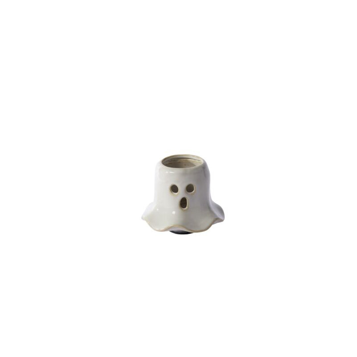 White ghost-shaped candle holder on a white background