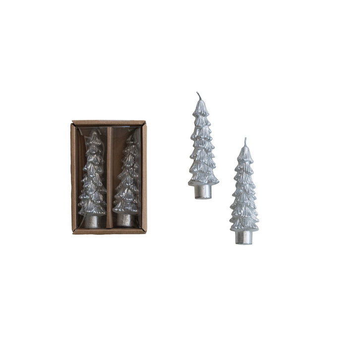 A set of two silver tree-shaped taper candles presented in a box, designed for Christmas decoration.