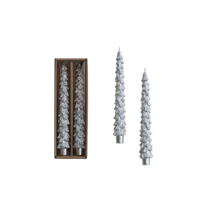 A set of two silver tree-shaped taper candles presented in a box.